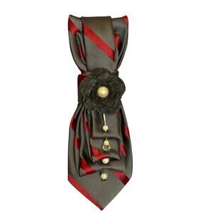 Vintage upcycled necktie with pearls, crochet & stick pin embellishments.